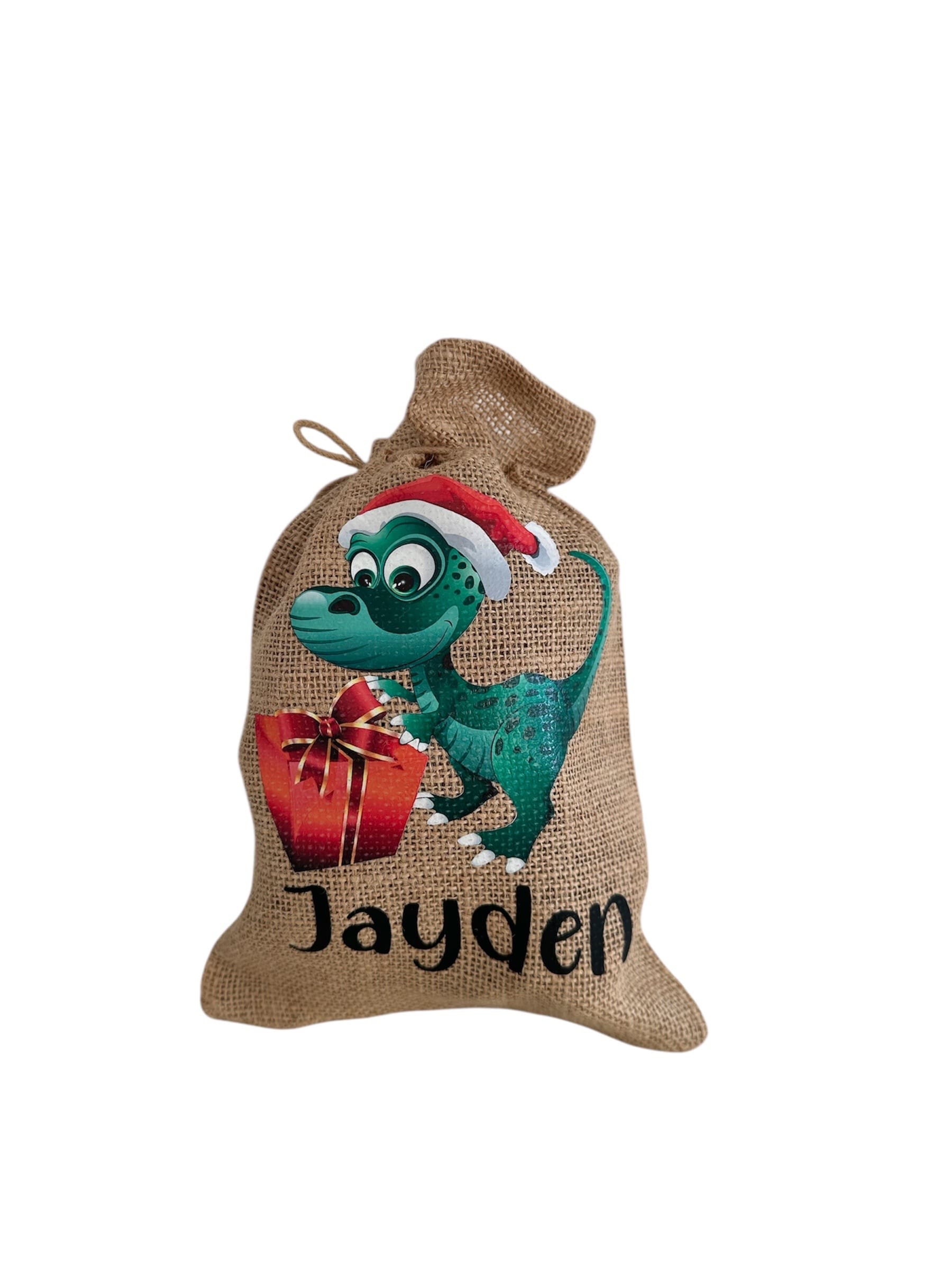 samichlaussaeckli-jayden-jute-dino-personalisiert-17×25-nilana.png samichlaussaeckli-jayden-jute-dino-personalisiert-17×25-nilana.png